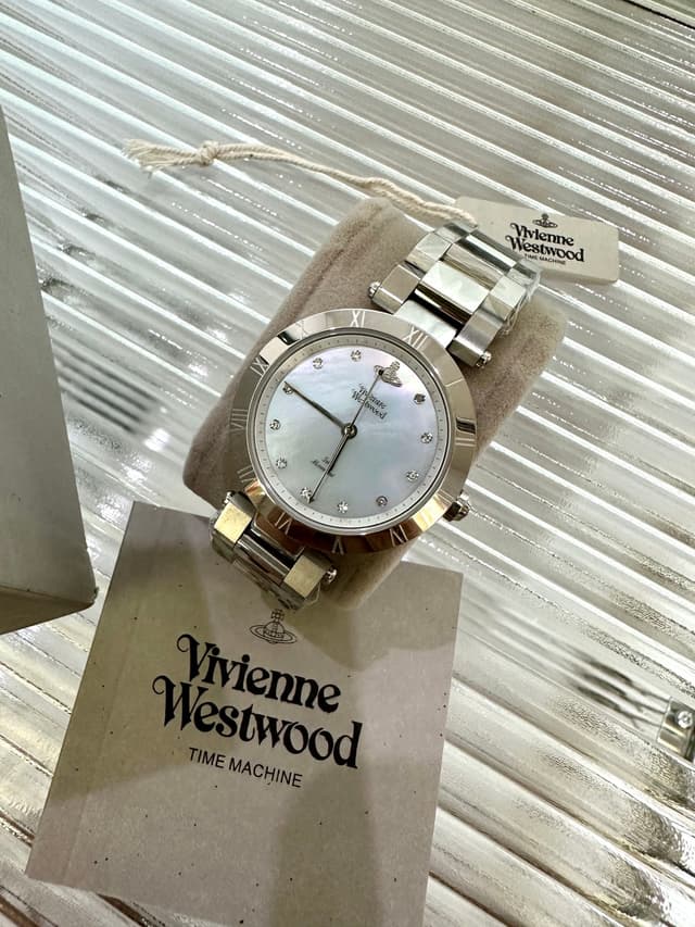 YUPOO Vivienne Westwood Mother of Pearl Watch | Rep Watches image 5